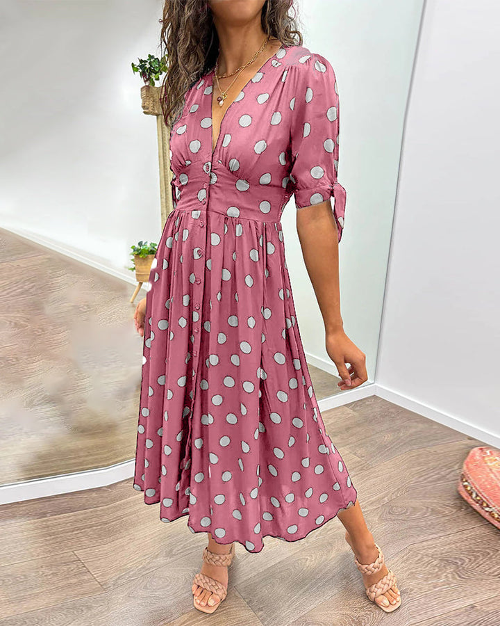 ANKA | Polka dot dress with flared hem and accentuated waist